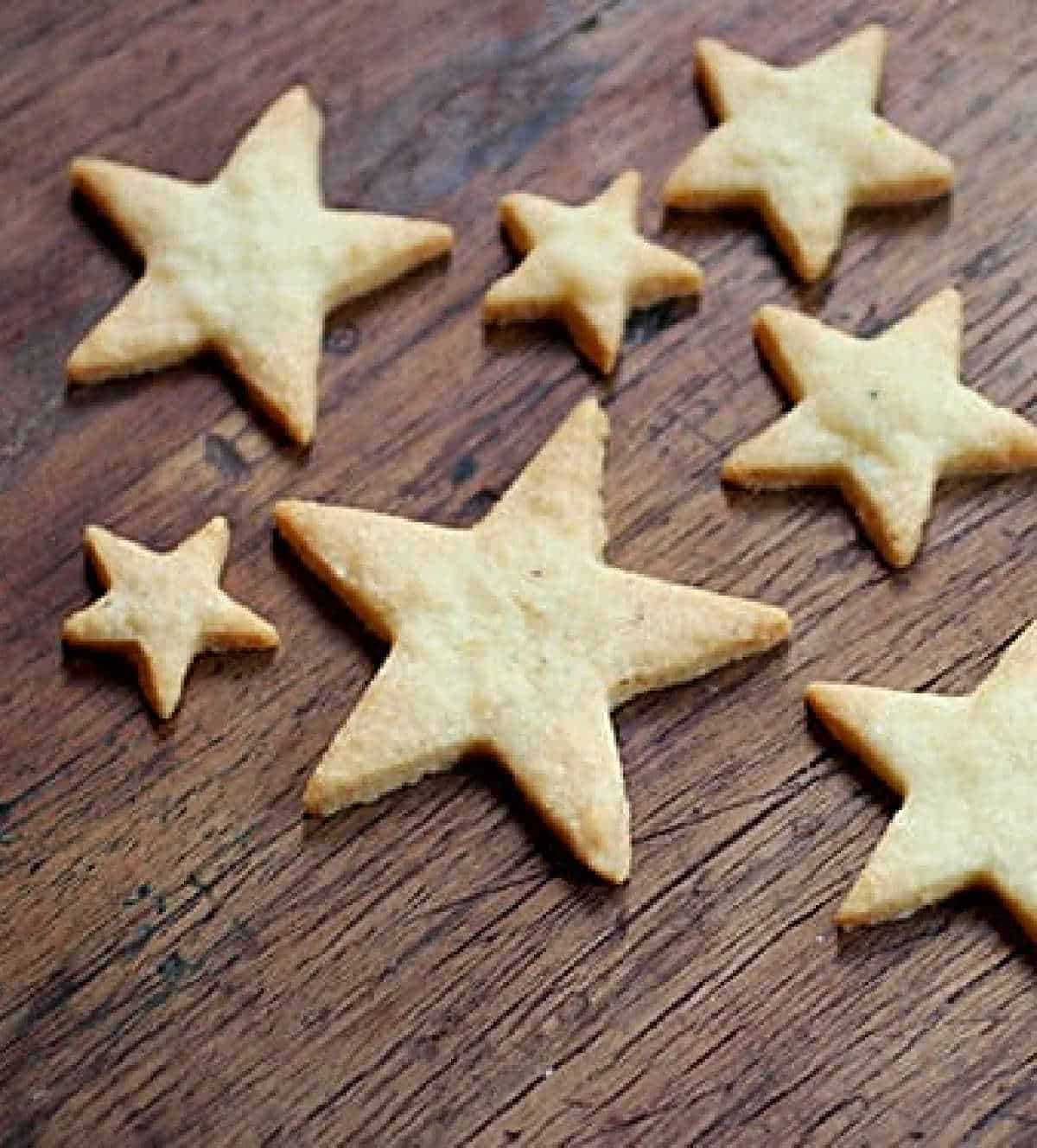 Wooden table with star cookie cut outs.