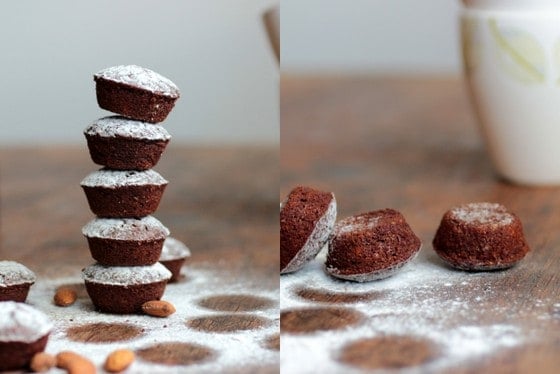 Two image collage of stack of chocolate financiers on a wooden table and after they fell down.