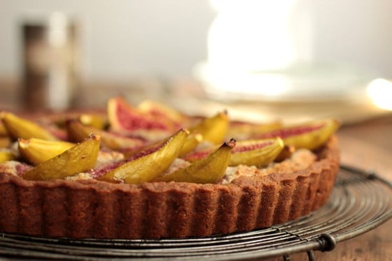 Partial view of Fresh Fig and Walnut Pie on a wire rack
