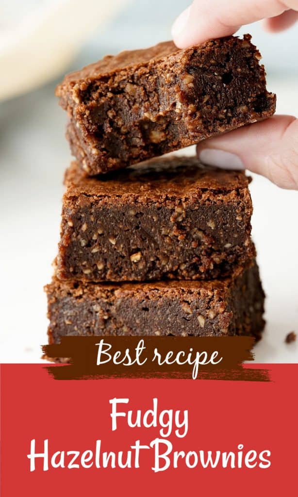 Red and white text overlay on image with stack of three brownies.