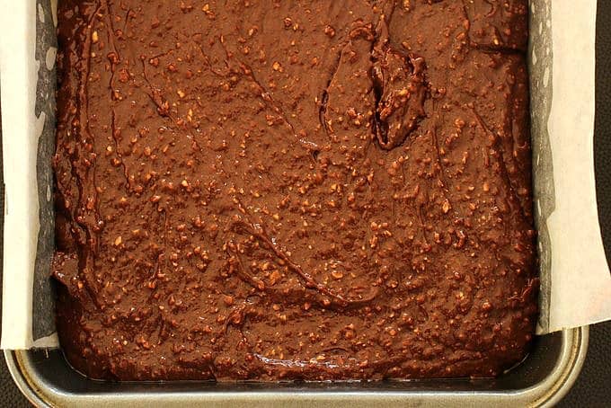 Metal pan an of unbaked hazelnut brownies