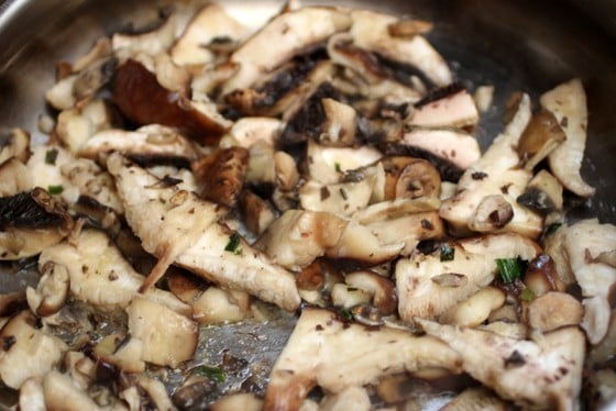 Mushrooms being cooked in skillet