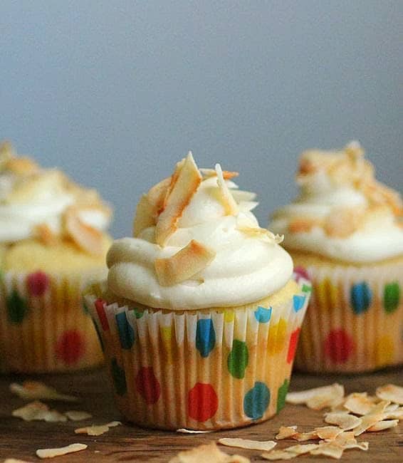 coconut cupcakes with passion fruit curd coconut cupcakes with passion fruit curd