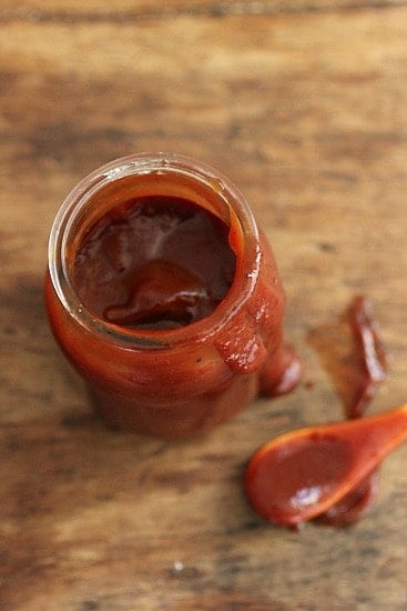 Jar of Bourbon Barbecue Sauce on wooden table