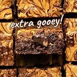 Black and white text overlay on squares of swirled loaded brownies.