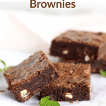 Close up of chocolate mint brownie squares, light surface, pinterest text