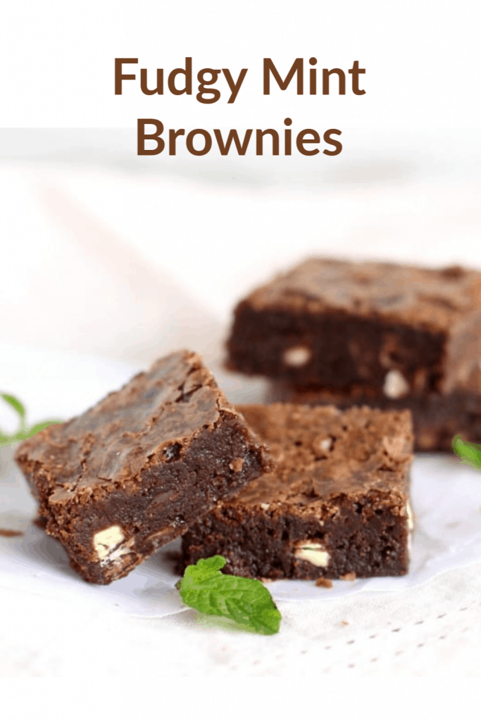 Close up of chocolate mint brownie squares, light surface, pinterest text