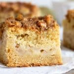 apple crumble coffee cake square on white surface