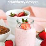 Easy strawberry dessert in glass jar, pink cloth, fresh berries