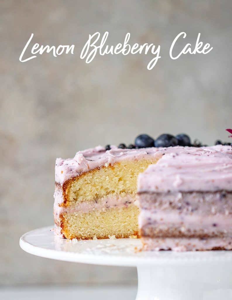 Cut Lemon Blueberry Cake on cake stand with text