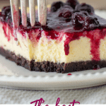 Square of cheesecake, hand with fork, text