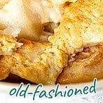 Blue and brown text overlay. Close up serving of old-fashioned pear cobbler.