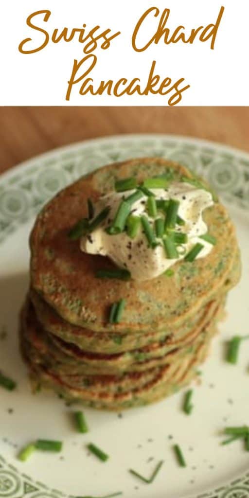 Stack of chard pancakes on white green plate, sour cream topping