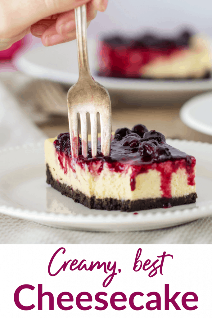 Slice of cheesecake with fork, long pin with text