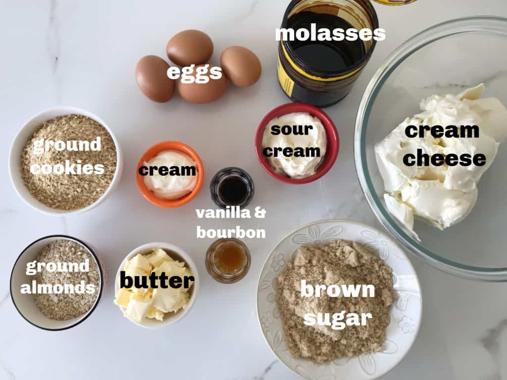 Brown sugar cheesecake ingredients in bowls on white surface