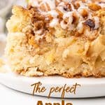 Brown text overlay on close up image of glazed apple coffee cake on a white plate.