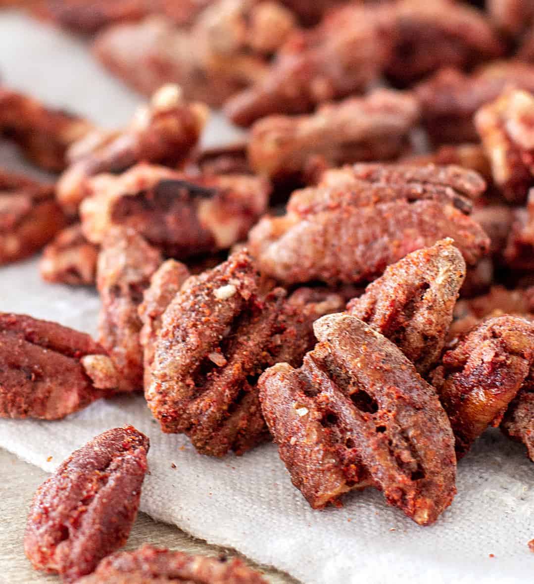 Close up of reddish sweet spicy pecans.