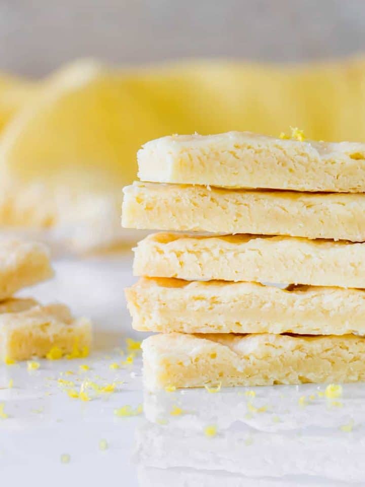 Shortbread fingers stacked on white surface