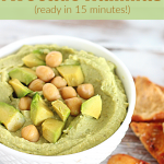 White bowl with green dip, chickpeas and pita chips; image with text