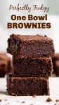 Stack of brownie squares on white surface; image with text