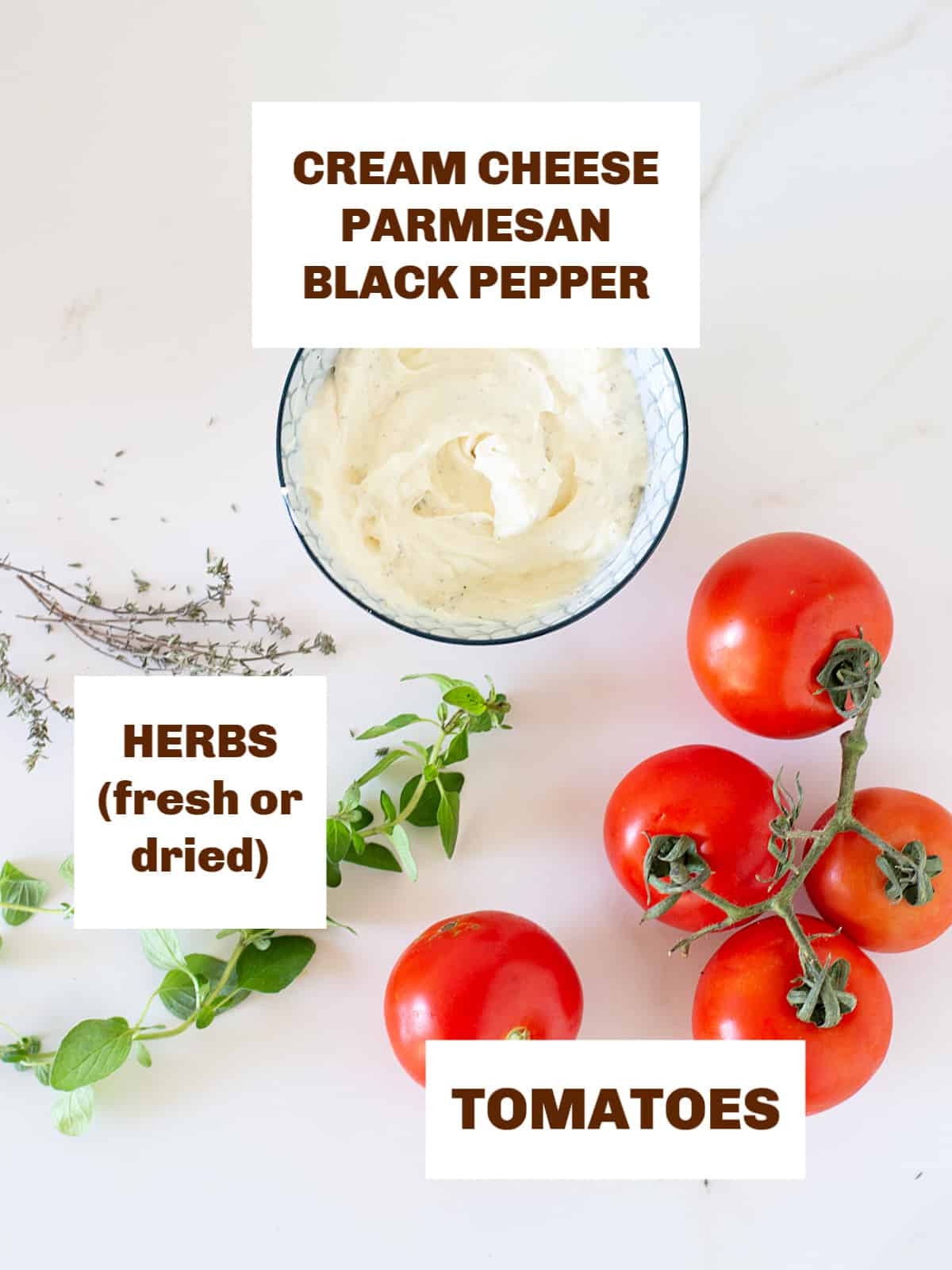 Tomatoes, bowl with soft cheese, and herbs on a white surface. Brown text overlay.