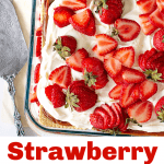 A glass dish with a strawberry cream dessert, image with red text