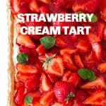 Over view of square strawberry Pie garnished with mint leaves; image with text