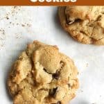 One almond chocolate chunk cookie on a white surface; image with text