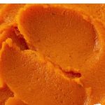 Close up of pumpkin puree; image with text