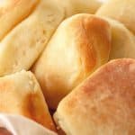 Dinner rolls close-up image with brown text