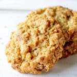 Close up of oatmeal cookie on white surface
