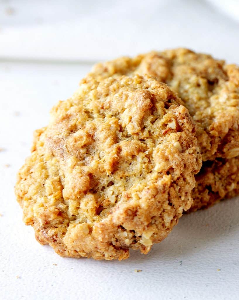 Close up of oatmeal cookie on white surface