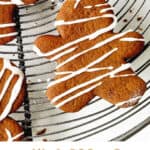 Gingerbread men iced cutout on wire rack; brown white text