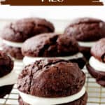 On a wire rack several chocolate whoopie pies; image with brown text overlay