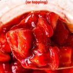 Wooden spoon with strawberry sauce, glass bowl underneath, red text overlay