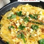 Cast iron skillet with pasta frittata on beige cloth; red white text overlay