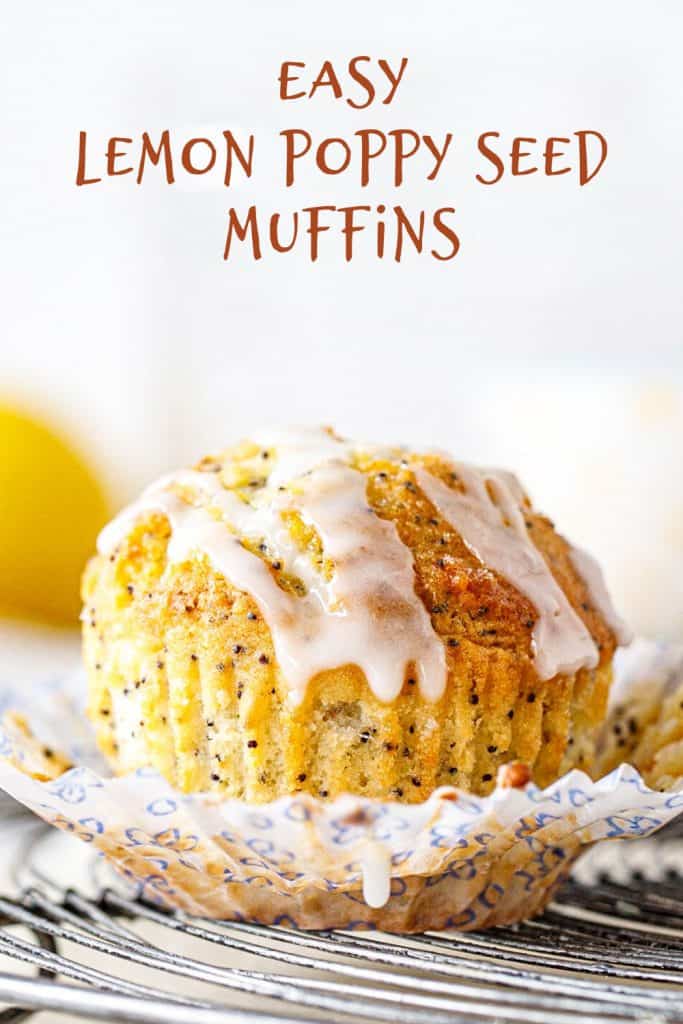 One glazed lemon muffin in open paper liner on wire rack, brown text overlay