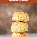 Brown background and text overlay with stack of three cheese scones