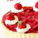 Partial view of strawberry pie with red text overlay