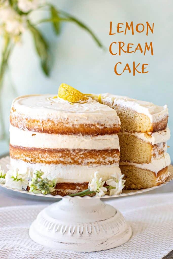 Layer lemon cake on cake stand with green background; brown text overlay