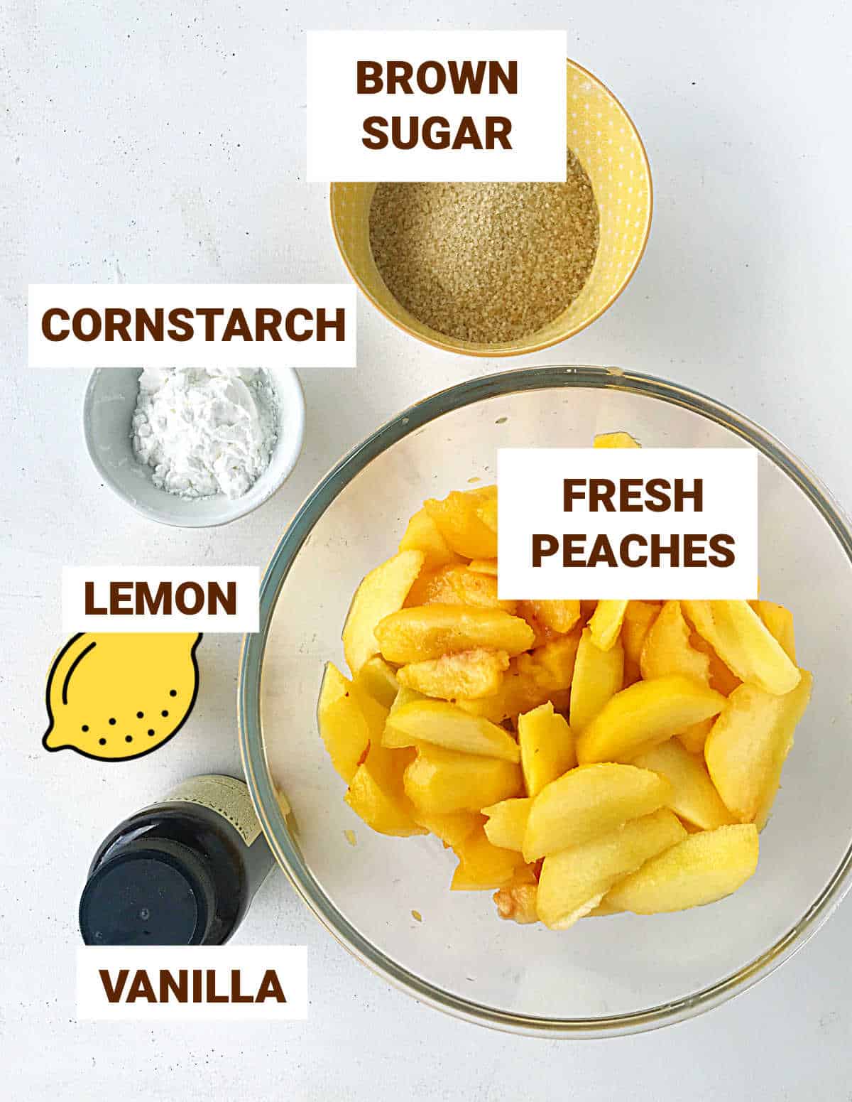 Ingredients for peach pie filling on white surface, including vanilla, lemon, cornstarch; brown text overlay