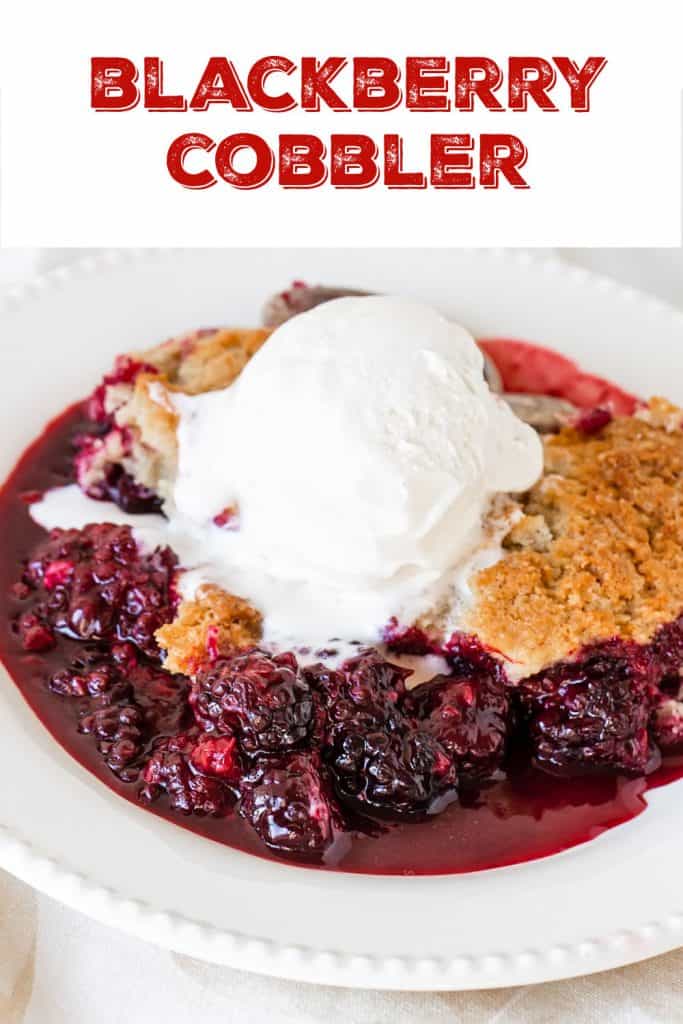 Serving of blackberry cobbler with ice cream on white plate; red text overlay