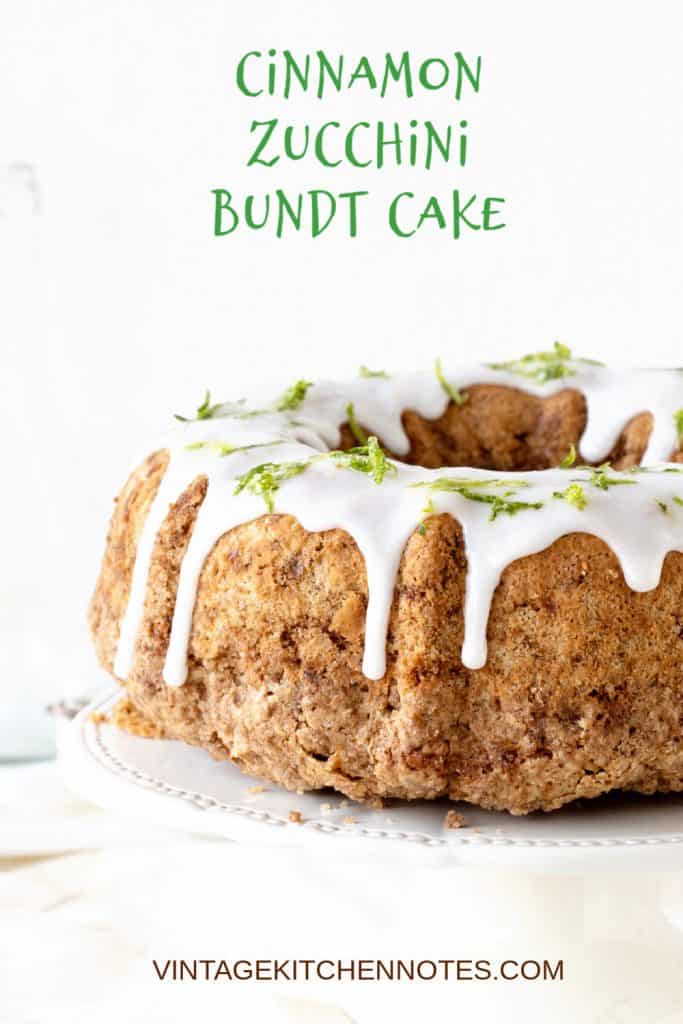 A white cake stand with glazed bundt cake; green text overlay