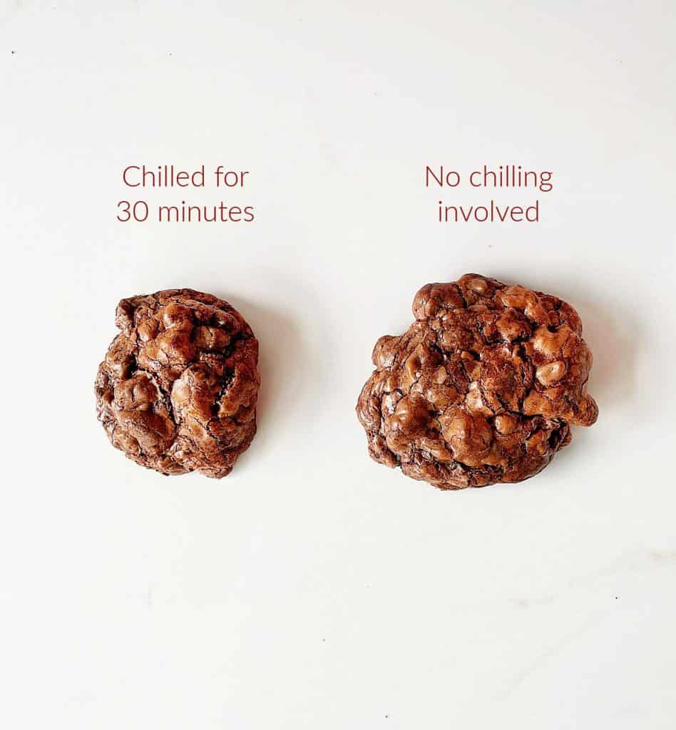 Two chocolate cookies on white surface, brown text overlay