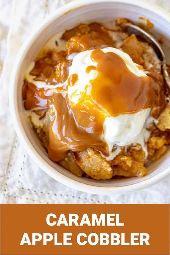 Caramel apple dump cake serving in white bowl with ice cream, white napkin, brown text overlay
