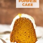 Slice of frosted pumpkin bundt cake on white cake server, brown background, orange text overlay