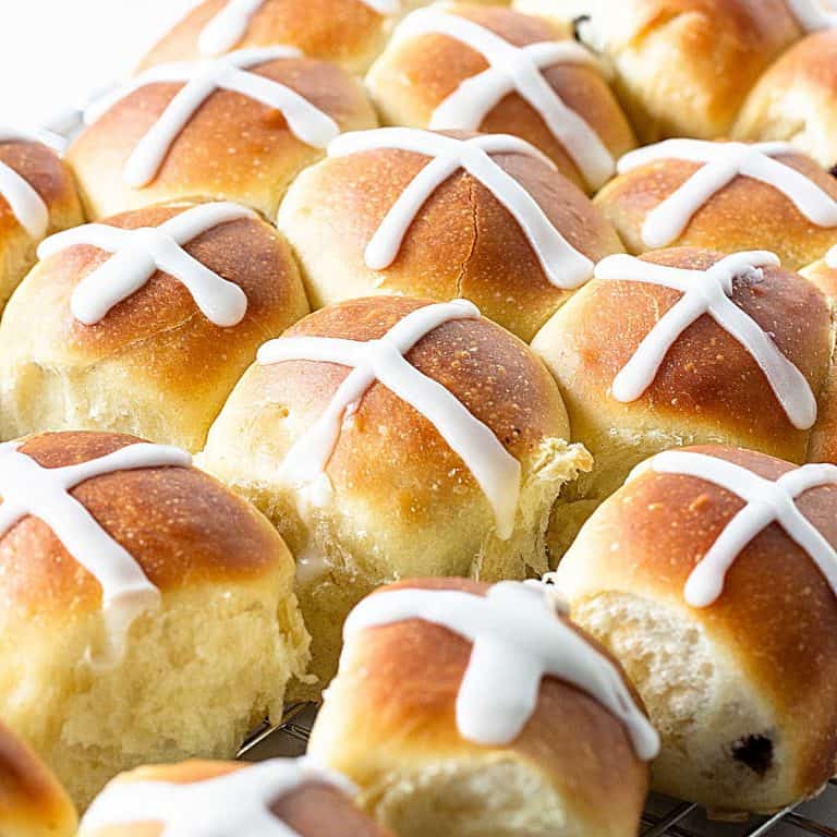 Tight cluster of hot cross buns. Close up image.