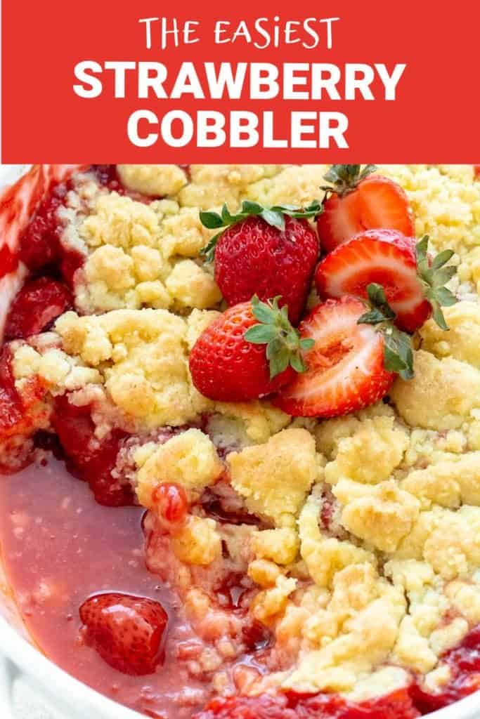 Pink white text overlay over close up image of juicy strawberry cobbler, fresh strawberries on top.