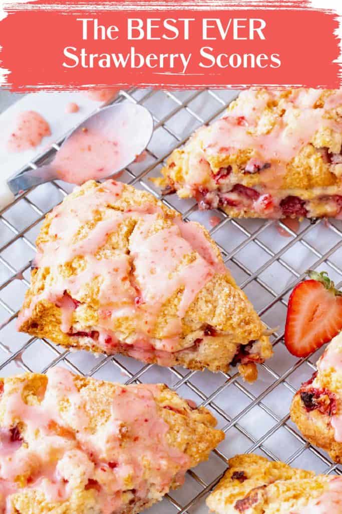 Pink text overlay on image with several triangle glazed strawberry scones.