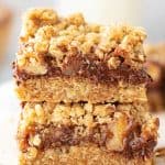 Front image of stacked chocolate oat bars, brown text overlay.